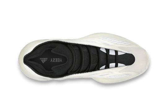 Sneaker Yeezy 700 V3 Azael, unisce stile e comfort con il suo design futuristico e dettagli inconfondibili. Tonalità di bianco e grigio, suola trasparente e ammortizzazione premium. L'iconico logo Yeezy presente sulla linguetta.